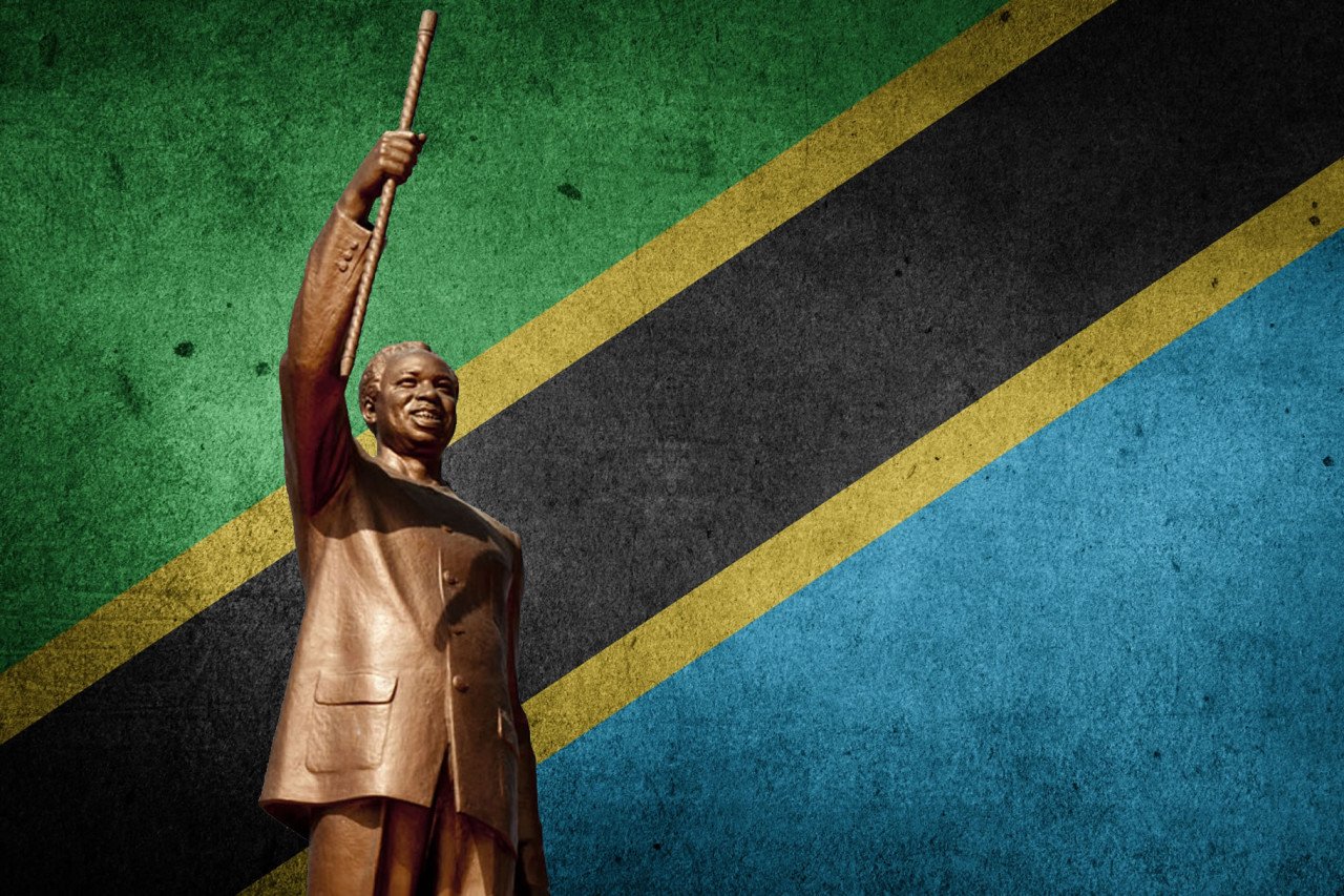 Statue of Mwalimu Julius Nyerere with Tanzanian flag